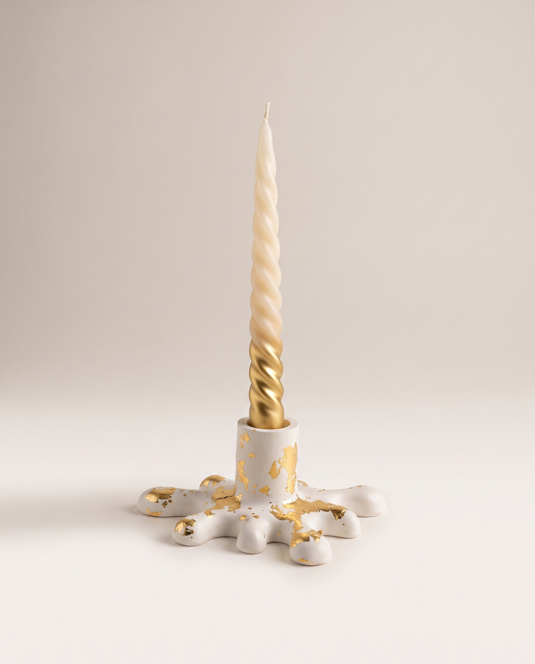 Splash Candle Holder - White & Gold Leaf, matte white splash-shaped ceramic taper candle holder with gold leaf accents